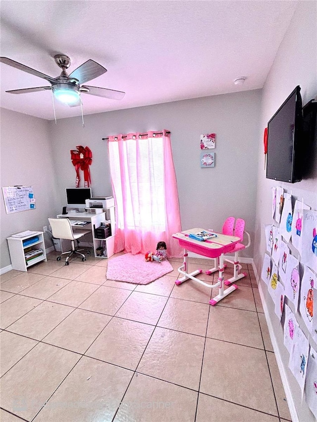 467 Martigues Dr, Kissimmee, FL 34759 - bedroom with an office area, light tile patterned floors, a ceiling fan, and baseboards