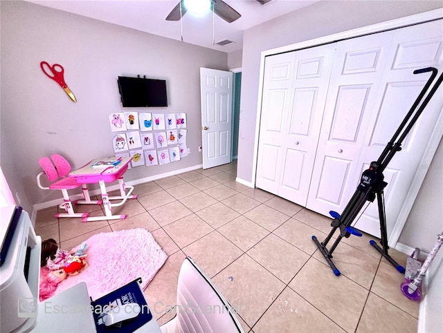 467 Martigues Dr, Kissimmee, FL 34759 - playroom with a ceiling fan, light tile patterned floors, and baseboards