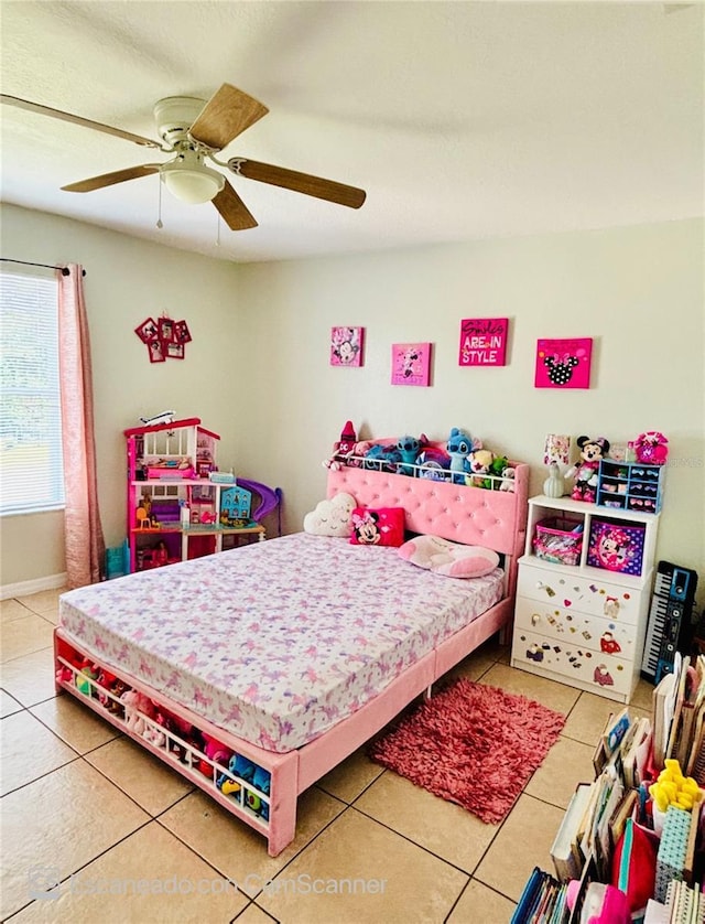 467 Martigues Dr, Kissimmee, FL 34759 - tiled bedroom featuring a ceiling fan