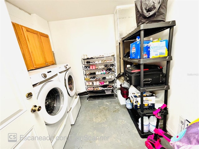 467 Martigues Dr, Kissimmee, FL 34759 - washroom with washing machine and clothes dryer and cabinet space