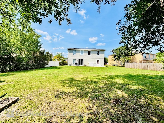 467 Martigues Dr, Kissimmee, FL 34759 - rear view of property featuring stucco siding