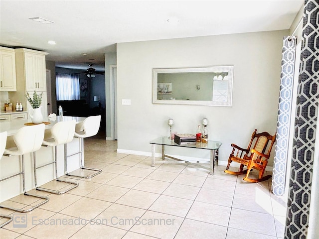 467 Martigues Dr, Kissimmee, FL 34759 - living area with light tile patterned floors, ceiling fan, baseboards, and recessed lighting