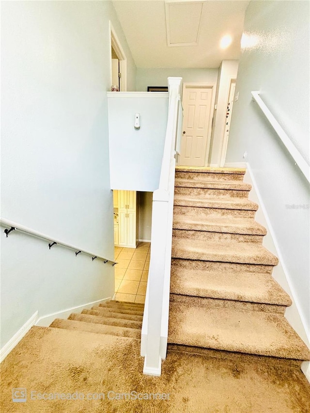 467 Martigues Dr, Kissimmee, FL 34759 - staircase with carpet floors and baseboards