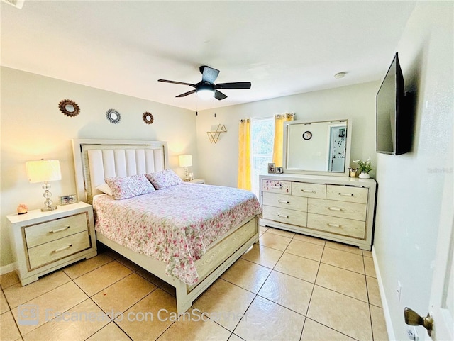 467 Martigues Dr, Kissimmee, FL 34759 - bedroom featuring light tile patterned flooring, baseboards, and a ceiling fan