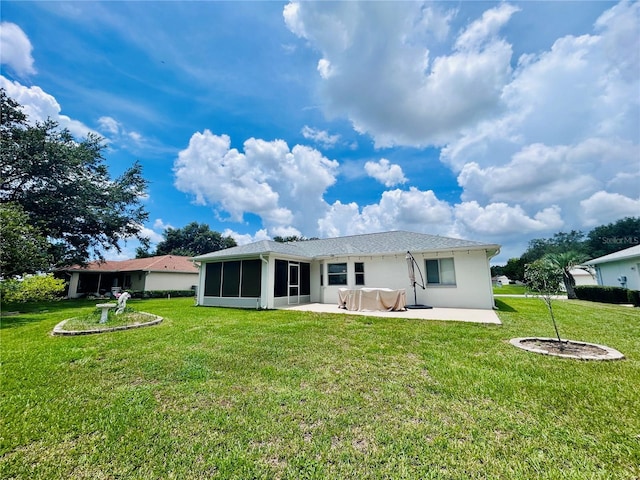 10237 SW 63rd Ave, Ocala, FL 34476 - rear view of property with a sunroom, a lawn, a patio area, and stucco siding