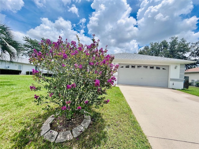 10237 SW 63rd Ave, Ocala, FL 34476 - ranch-style home with concrete driveway, a front lawn, stucco siding, and an attached garage