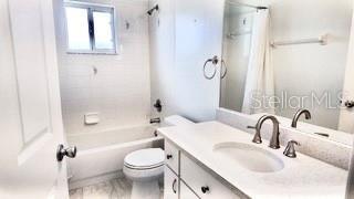 10237 SW 63rd Ave, Ocala, FL 34476 - full bath with vanity and shower / bath combo