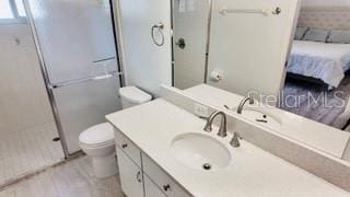 10237 SW 63rd Ave, Ocala, FL 34476 - ensuite bathroom featuring a shower with shower door and vanity