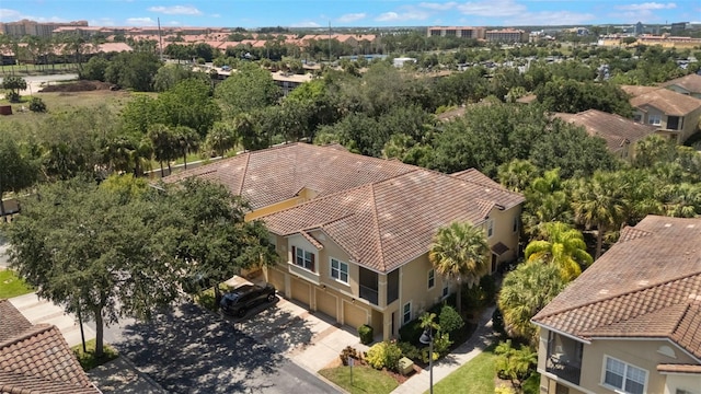 7521 Pellham Way, Kissimmee, FL 34747 - aerial view of property and surrounding area featuring a tree filled landscape