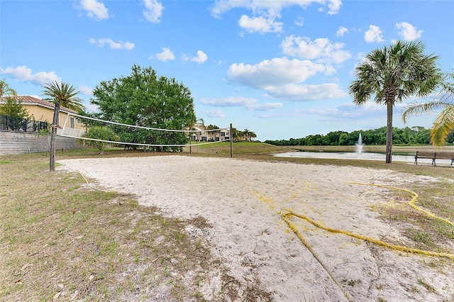 7521 Pellham Way, Kissimmee, FL 34747 - view of community featuring a water view, volleyball court, and fence