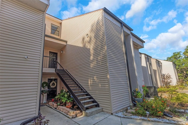 5151 Puritan Cir Unit 1022, Tampa, FL 33617 - view of building exterior featuring stairway