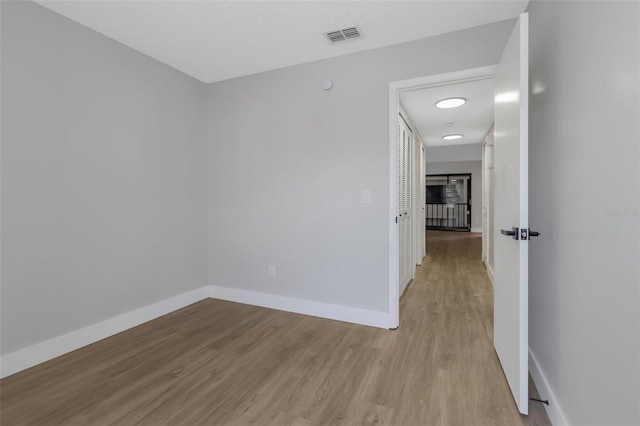 5151 Puritan Cir Unit 1022, Tampa, FL 33617 - spare room with wood finished floors and baseboards