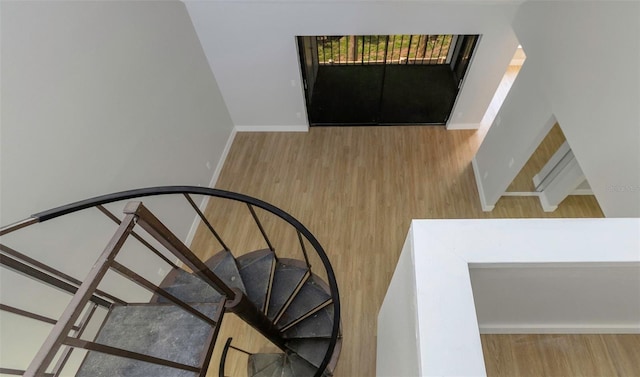 5151 Puritan Cir Unit 1022, Tampa, FL 33617 - staircase with wood finished floors and baseboards
