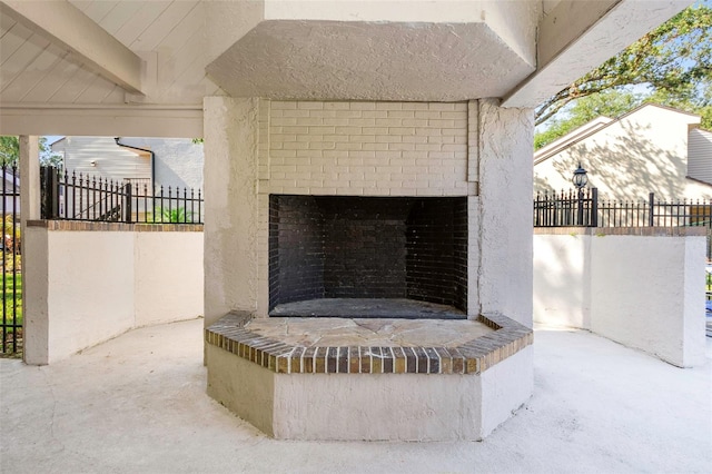 5151 Puritan Cir Unit 1022, Tampa, FL 33617 - exterior view of an outdoor brick fireplace