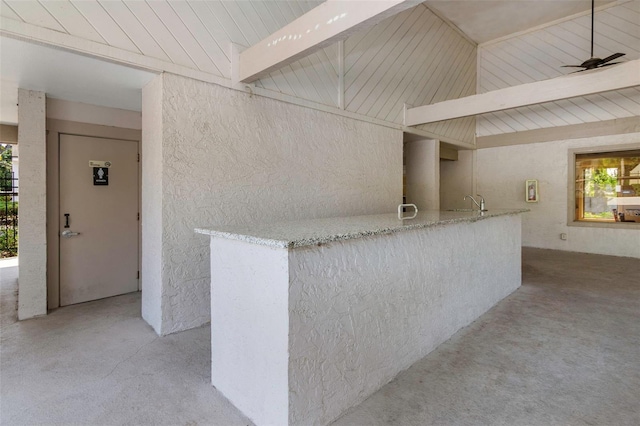 5151 Puritan Cir Unit 1022, Tampa, FL 33617 - bar featuring lofted ceiling and a ceiling fan