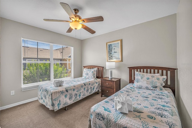 2614 Lodi Cir Unit 106, Kissimmee, FL 34746 - bedroom with carpet flooring, baseboards, and ceiling fan