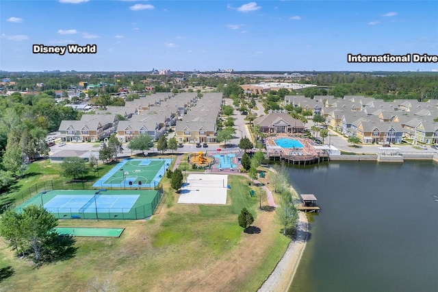 2614 Lodi Cir Unit 106, Kissimmee, FL 34746 - aerial view of residential area featuring a pool area and a nearby body of water