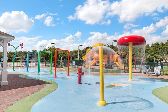2614 Lodi Cir Unit 106, Kissimmee, FL 34746 - community playground featuring fence