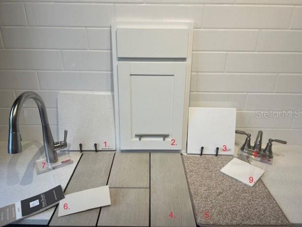 detailed view of decorative backsplash and a sink