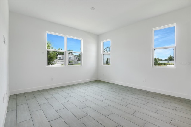 3723 Malad Way, Tavares, FL 32778 - spare room with baseboards