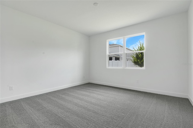3723 Malad Way, Tavares, FL 32778 - spare room featuring carpet