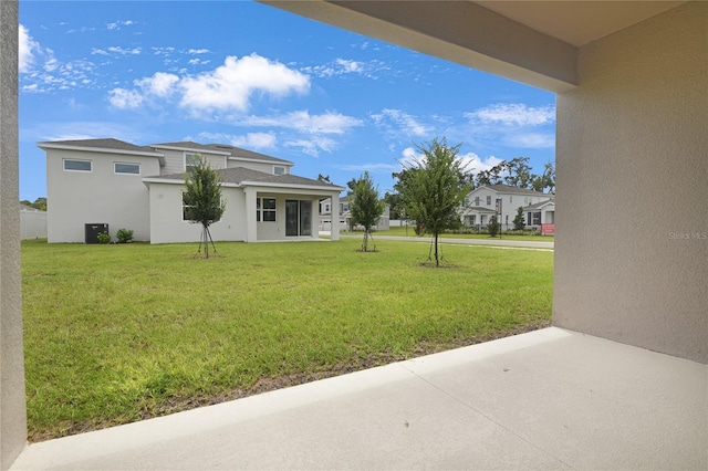 3723 Malad Way, Tavares, FL 32778 - view of grassy yard with a patio