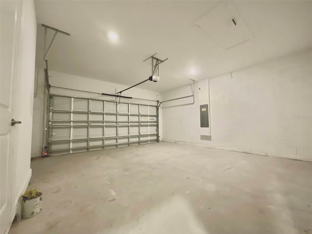 1001 Umbria Dr, Poinciana, FL 34759 - garage with a garage door opener and electric panel