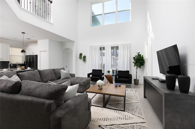 4290 Paragraph Dr, Kissimmee, FL 34746 - living room featuring healthy amount of natural light and a towering ceiling