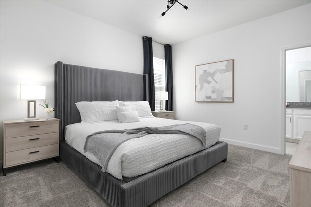4290 Paragraph Dr, Kissimmee, FL 34746 - bedroom featuring carpet floors, baseboards, and connected bathroom