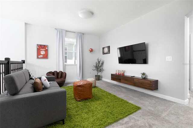 4290 Paragraph Dr, Kissimmee, FL 34746 - carpeted living room featuring baseboards