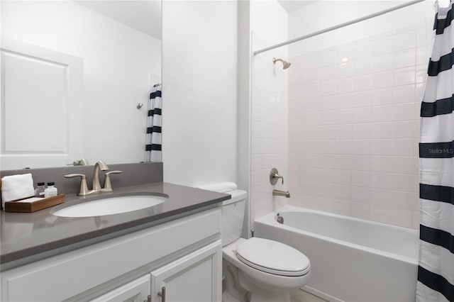 4290 Paragraph Dr, Kissimmee, FL 34746 - bathroom featuring toilet, vanity, and shower / bath combo with shower curtain