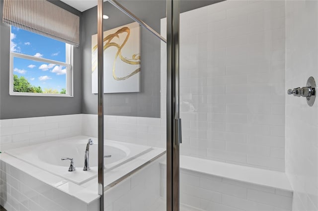 9253 Players Dr, Weeki Wachee, FL 34613 - bathroom with a stall shower and a garden tub