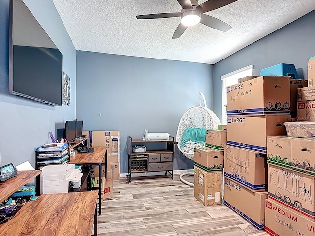 140 Trinity Ridge Cir, Davenport, FL 33897 - office with ceiling fan, a textured ceiling, and wood finished floors