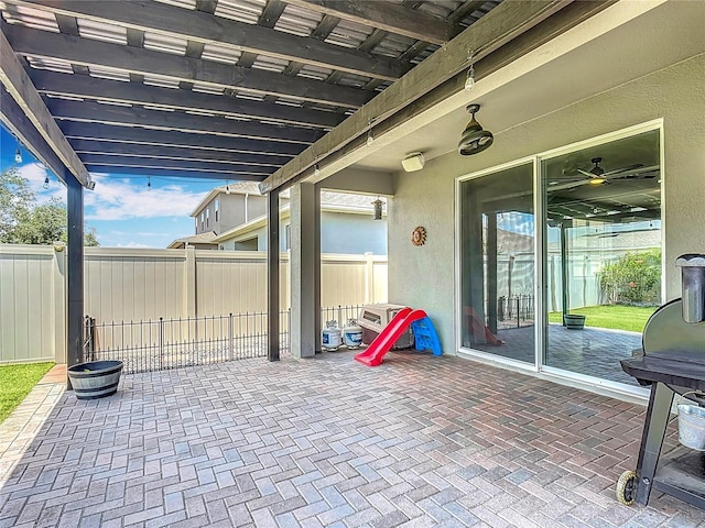 140 Trinity Ridge Cir, Davenport, FL 33897 - fenced backyard with a patio area and a grill