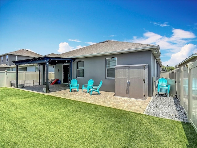 140 Trinity Ridge Cir, Davenport, FL 33897 - rear view of house with a patio area, stucco siding, and a pergola