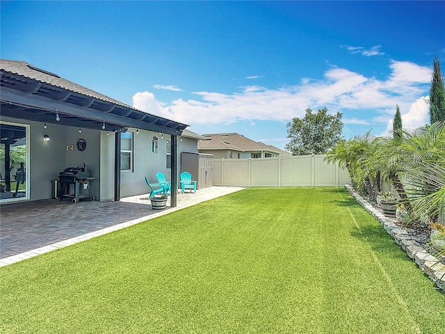 140 Trinity Ridge Cir, Davenport, FL 33897 - view of yard featuring a patio