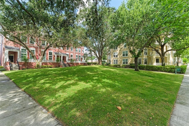 438 Water St Unit 438, Celebration, FL 34747 - view of community with a yard