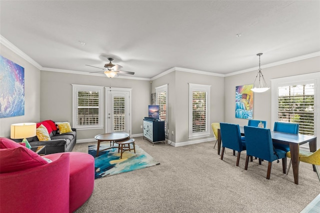 438 Water St Unit 438, Celebration, FL 34747 - living room featuring carpet floors, ornamental molding, and ceiling fan