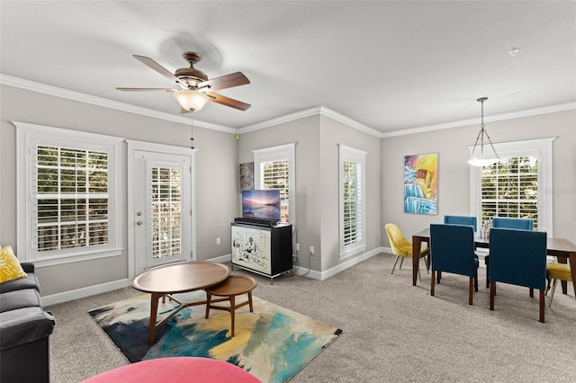 438 Water St Unit 438, Celebration, FL 34747 - carpeted living room featuring a ceiling fan and crown molding