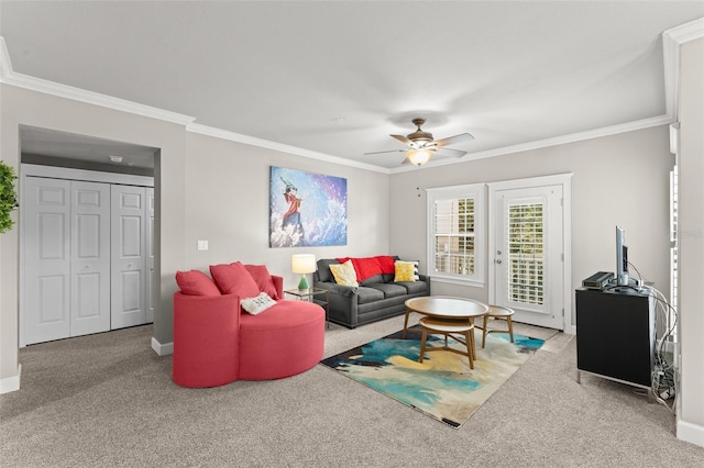 438 Water St Unit 438, Celebration, FL 34747 - living area featuring ceiling fan, ornamental molding, and carpet flooring