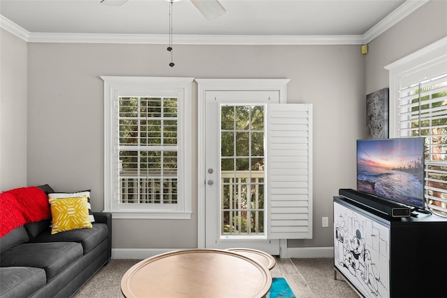 438 Water St Unit 438, Celebration, FL 34747 - carpeted living area with crown molding and ceiling fan