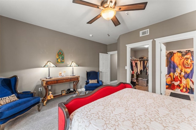438 Water St Unit 438, Celebration, FL 34747 - carpeted bedroom with a closet, a walk in closet, and ceiling fan