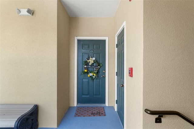 438 Water St Unit 438, Celebration, FL 34747 - doorway to property with stucco siding