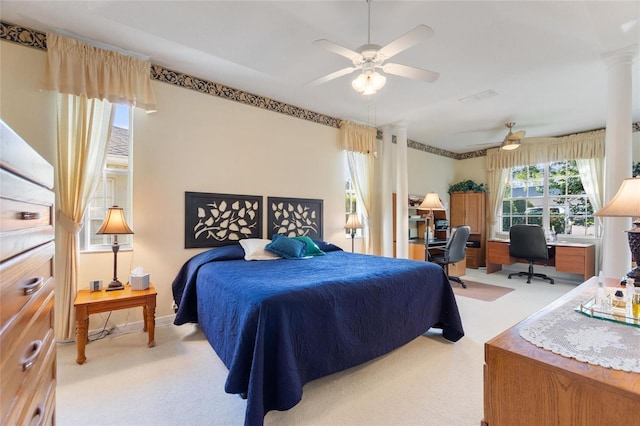 124 Ashton Dr, Davenport, FL 33837 - bedroom featuring carpet floors, a desk, decorative columns, and a ceiling fan