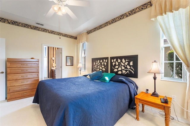 124 Ashton Dr, Davenport, FL 33837 - bedroom with carpet flooring, ensuite bathroom, and ceiling fan