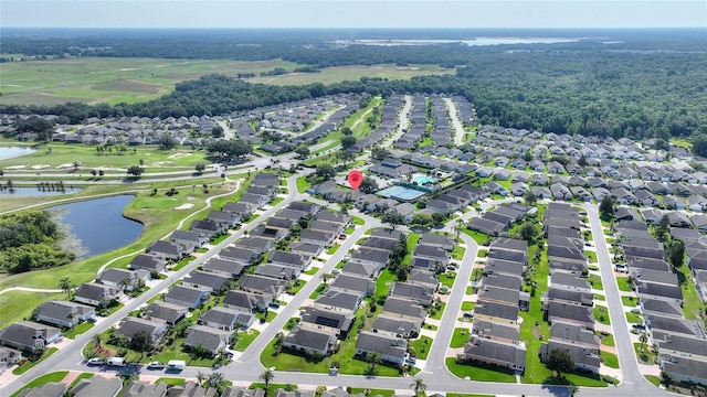 124 Ashton Dr, Davenport, FL 33837 - aerial overview of property's location featuring a nearby body of water, nearby suburban area, and a local golf course
