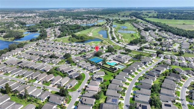 124 Ashton Dr, Davenport, FL 33837 - aerial view of property's location featuring a large body of water and nearby suburban area