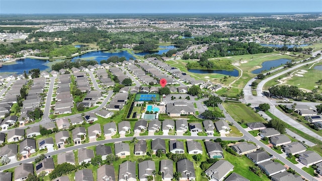124 Ashton Dr, Davenport, FL 33837 - aerial perspective of suburban area featuring a large body of water