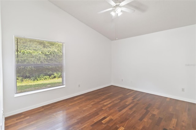 3370 Cypress Point Cir, Saint Cloud, FL 34772 - empty room featuring vaulted ceiling, dark wood-type flooring, baseboards, and ceiling fan