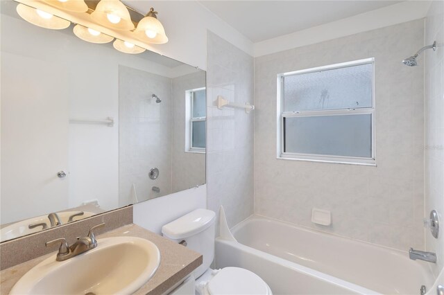 3370 Cypress Point Cir, Saint Cloud, FL 34772 - full bath with toilet, vanity, and  shower combination
